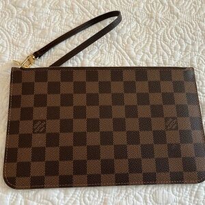 Authentic Louis Vuitton Neverfull Danier wristlet.
